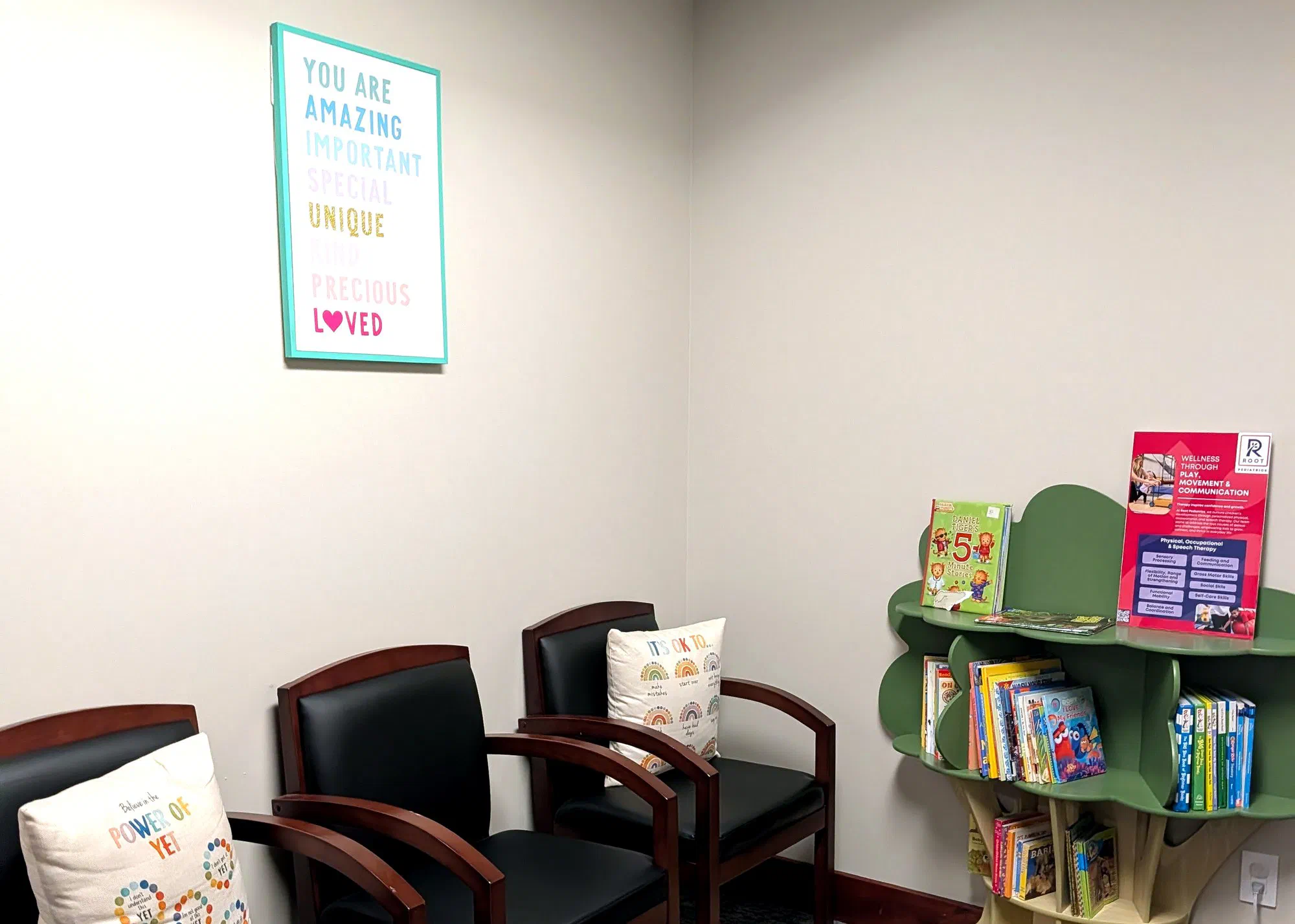 Children's waiting area with book tree at Root Pediatrics in Bozeman, Montana