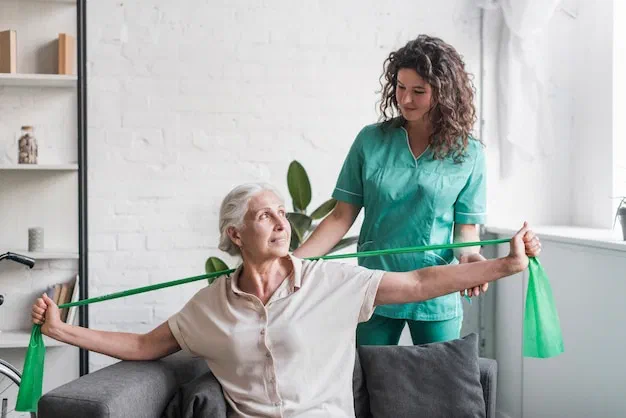 Physical therapist coaching a patient through progressive strengthening as part of a rehabilitation plan at Root Therapy and Wellness in Bozeman, Montana