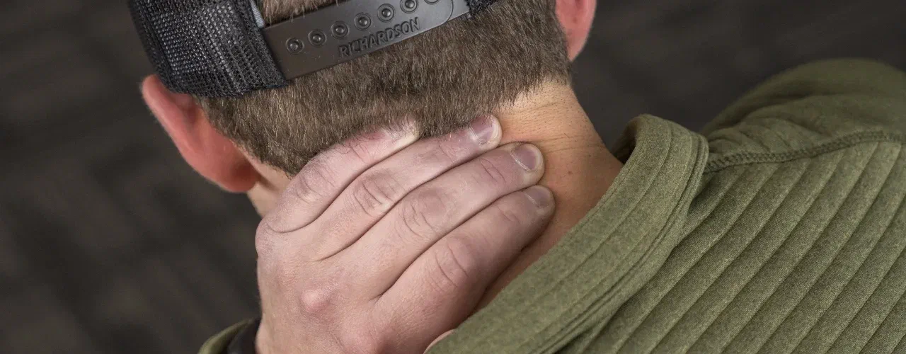 Physical therapist performing gentle neck mobilization at Root Therapy and Wellness in Bozeman, Montana