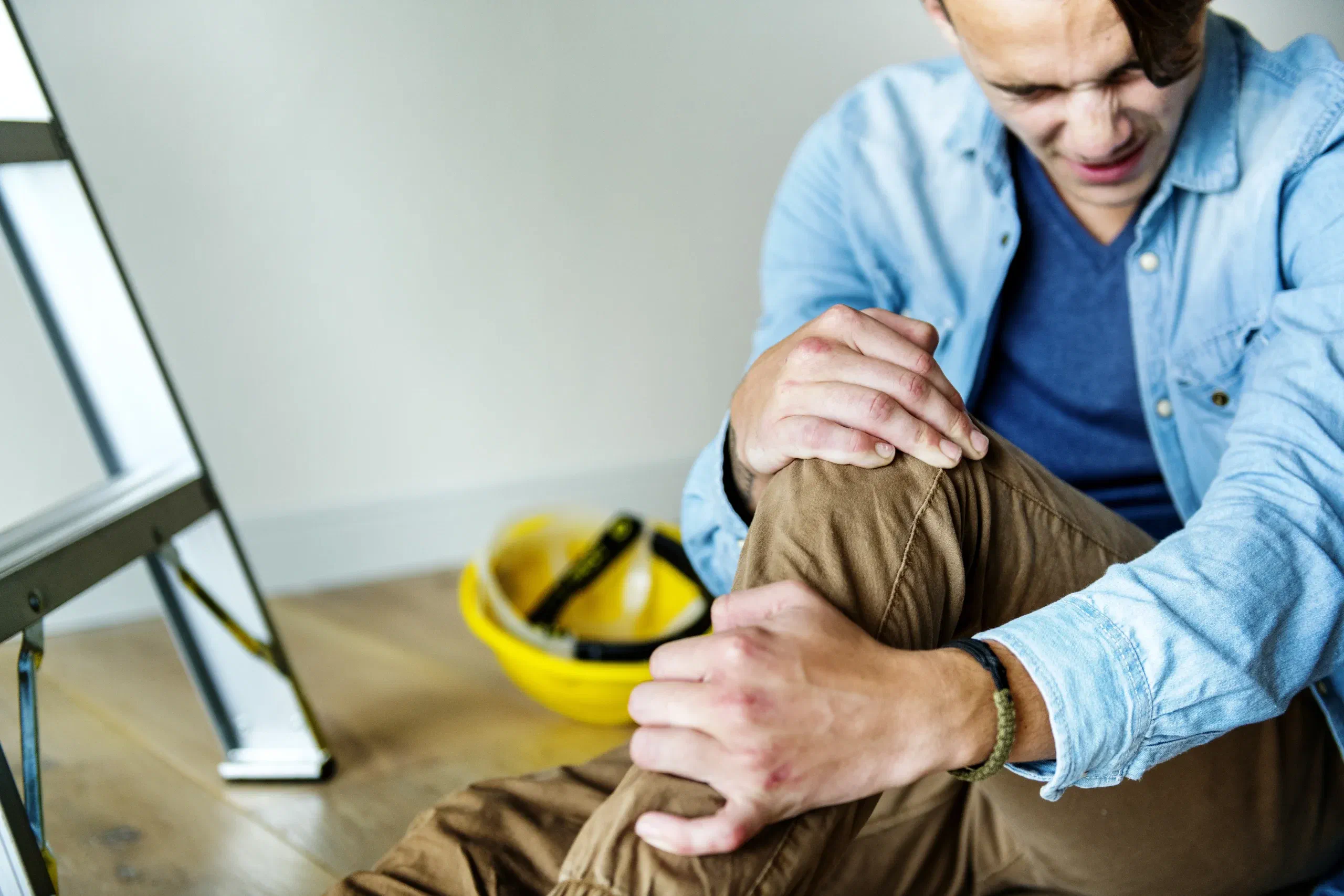 Physical therapist assessing job-task lifting capacity for workers' comp at Root Therapy and Wellness in Bozeman, Montana